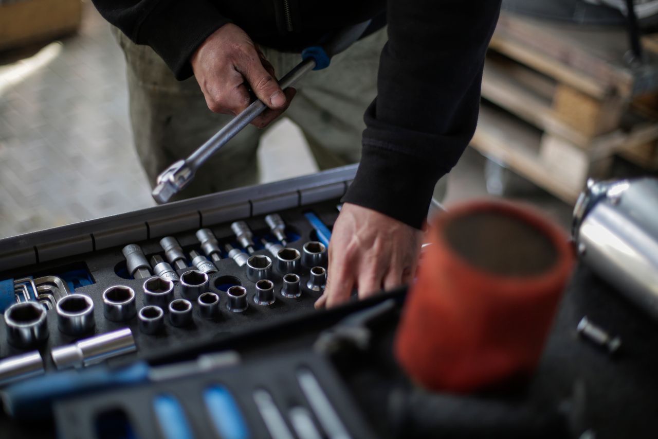 Mechanic choosing tools choosing the right socket
